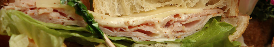 Eating Deli Sandwich at Broad Street Paulie's restaurant in Boston, MA.